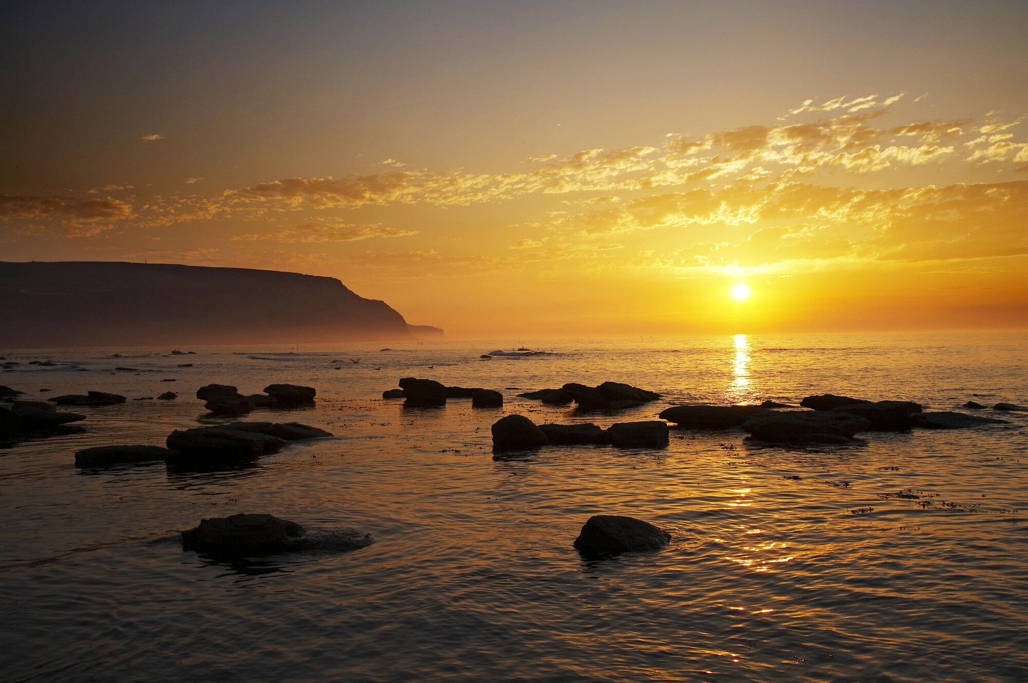 Sunset Boulby Cliffs from Cowbar Staithes: Mike Kipling/NYMNP